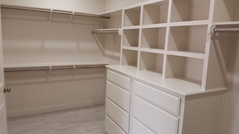 200 Hidden Grove Court master closet with built in shelves and cabinets
