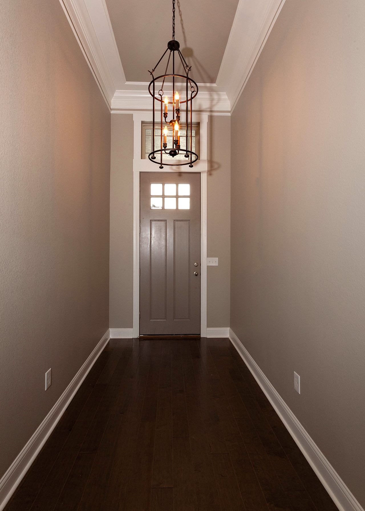 195 Hidden Grove Court Entry With modern hanging chandelier