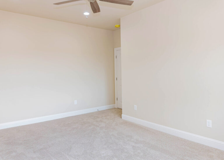 240 Riverstone two story home bedroom tan carpet tan walls white trim