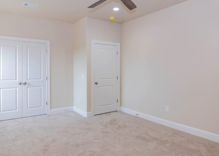 240 Riverstone two story home bedroom tan carpet tan walls white trim