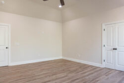 470 hidden grove court spec built home lumberton texas master bedroom light brown flooring with off whtie walls